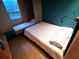ibis budget Medellín Itagüí Metro客房内的一张或多张床位