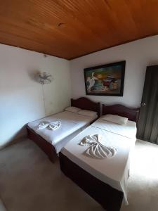 Lova arba lovos apgyvendinimo įstaigoje Hotel Sol y Mar