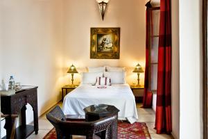 Postel nebo postele na pokoji v ubytování Riad Al Loune + 37 fotografií