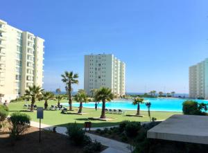 Πισίνα στο ή κοντά στο Departamento en primera línea, Papudo Laguna