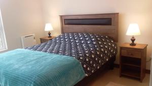 Ένα ή περισσότερα κρεβάτια σε δωμάτιο στο Departamento en primera línea, Papudo Laguna