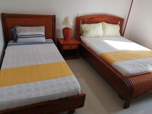 Postel nebo postele na pokoji v ubytování Girardot Resort