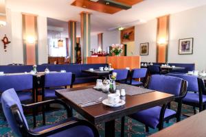 Reštaurácia alebo iné gastronomické zariadenie v ubytovaní PLAZA Hotel Blankenburg Ditzingen, Sure Hotel Collection