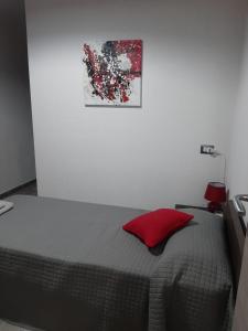 Postel nebo postele na pokoji v ubytování Domos Loru