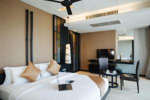 Кровать или кровати в номере De Chai Oriental Nimman - SHA Plus