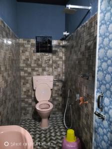 Ванная комната в Dekapara Airport Guest House
