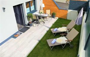 Patio lub wspólna przestrzeń na świeżym powietrzu w obiekcie Easy Living Apartment Ötztal