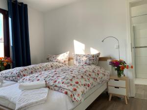 Postel nebo postele na pokoji v ubytování Ferienhaus bei den Kreidefelsen - Ihr Zuhause auf Rügen
