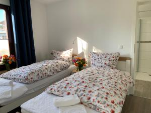Postel nebo postele na pokoji v ubytování Ferienhaus bei den Kreidefelsen - Ihr Zuhause auf Rügen