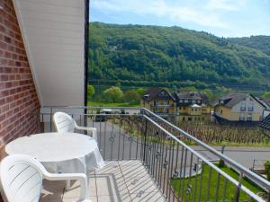 A balcony or terrace at Wein und Gästehaus Scheid