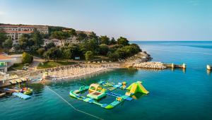 an aerial view of a water park with a water slide at Maistra Select Belvedere Resort in Vrsar