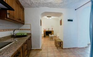 Una cocina o zona de cocina en Casas Cueva Molino Fuencaliente