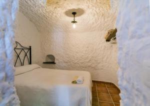 Cama o camas de una habitación en Casas Cueva Molino Fuencaliente