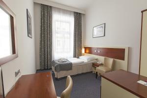 Postel nebo postele na pokoji v ubytování Hotel Atos + 37 fotografií