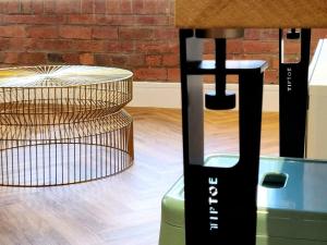 a stand with a table and a stack of stairs at I Should Cocoa (York) - Seebohm in York