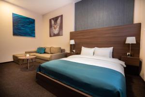 Voodi või voodid majutusasutuse Veneti Suites toas