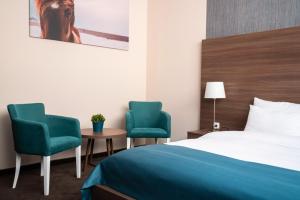 Voodi või voodid majutusasutuse Veneti Suites toas