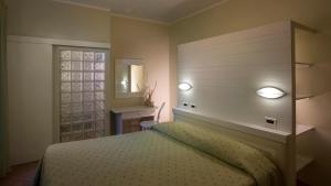 Postel nebo postele na pokoji v ubytování Boutique Hotel Ilio