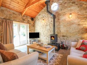 TV a/nebo společenská místnost v ubytování Pond Cottage