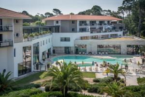 an aerial view of a hotel with a swimming pool at Thalazur Arcachon in Arcachon