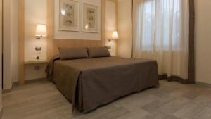 Postel nebo postele na pokoji v ubytování Boutique Hotel Ilio