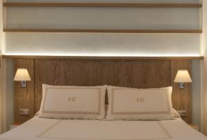 Postel nebo postele na pokoji v ubytování Boutique Hotel Ilio
