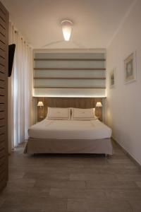 Postel nebo postele na pokoji v ubytování Boutique Hotel Ilio