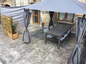 Patio nebo venkovní prostory v ubytování Gîte sur Loue