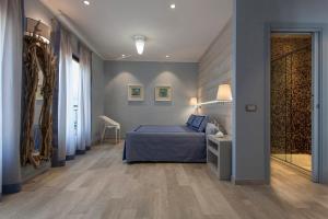 Postel nebo postele na pokoji v ubytování Boutique Hotel Ilio