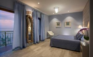 Postel nebo postele na pokoji v ubytování Boutique Hotel Ilio