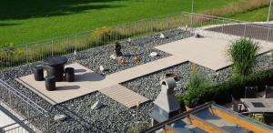 an aerial view of a backyard with a garden with a patio at Gästehaus Karoline in Oberaichwald