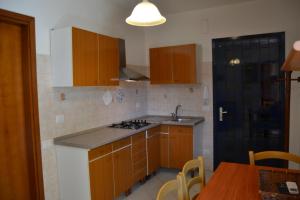 Kuchyň nebo kuchyňský kout v ubytování Venere Apartament