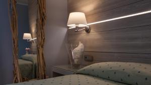 Postel nebo postele na pokoji v ubytování Boutique Hotel Ilio