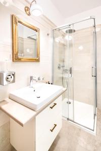 Et badeværelse på Apartamenty Pod Baranem