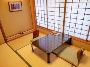 Posezení v ubytování Ryokan Ryokufuso
