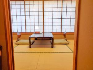 Posezení v ubytování Ryokan Ryokufuso