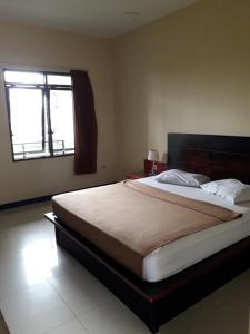 Surya Hotel & Resort 객실 침대