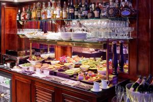 a buffet with a lot of food on display at 41 in London
