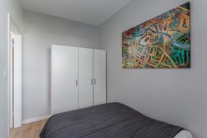 Posteľ alebo postele v izbe v ubytovaní Chill Apartments Wolska 45