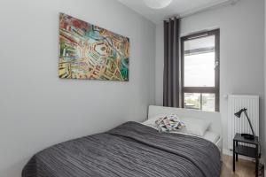 Posteľ alebo postele v izbe v ubytovaní Chill Apartments Wolska 45