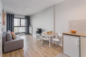 Kuchyňa alebo kuchynka v ubytovaní Chill Apartments Wolska 45