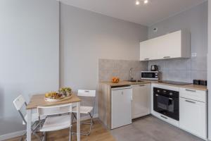 Kuchyňa alebo kuchynka v ubytovaní Chill Apartments Wolska 45