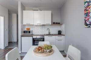 Kuchyňa alebo kuchynka v ubytovaní Chill Apartments Wolska 45