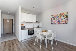 Kuchyňa alebo kuchynka v ubytovaní Chill Apartments Wolska 45