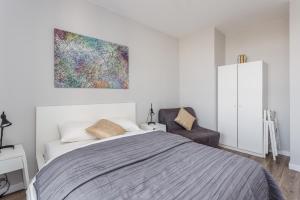 Posteľ alebo postele v izbe v ubytovaní Chill Apartments Wolska 45