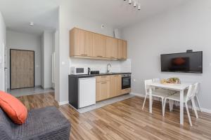 Kuchyňa alebo kuchynka v ubytovaní Chill Apartments Wolska 45