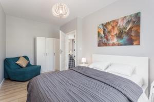 Posteľ alebo postele v izbe v ubytovaní Chill Apartments Wolska 45