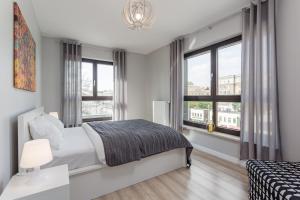 Posteľ alebo postele v izbe v ubytovaní Chill Apartments Wolska 45