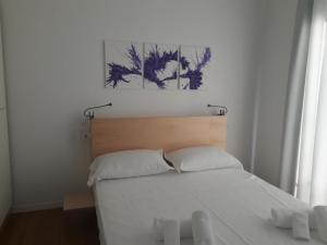 Letto o letti in una camera di Luna Blu