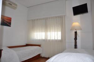 Cama ou camas em um quarto em Bonne Etoile